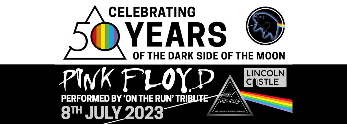 a black and white graphic with a rainbow prism in reading 50 of the dark side of the moon, Pink Floyd