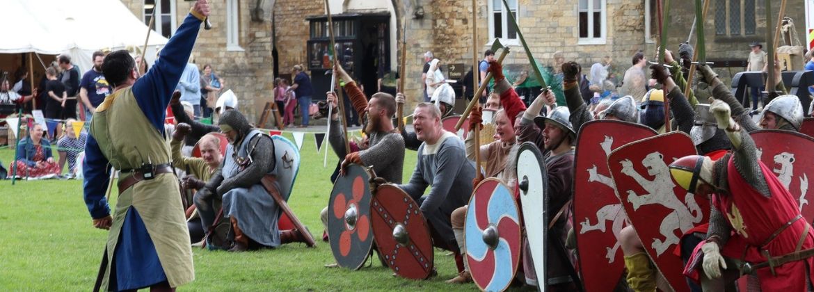 Photo shows medieval reenactors on the battlefield