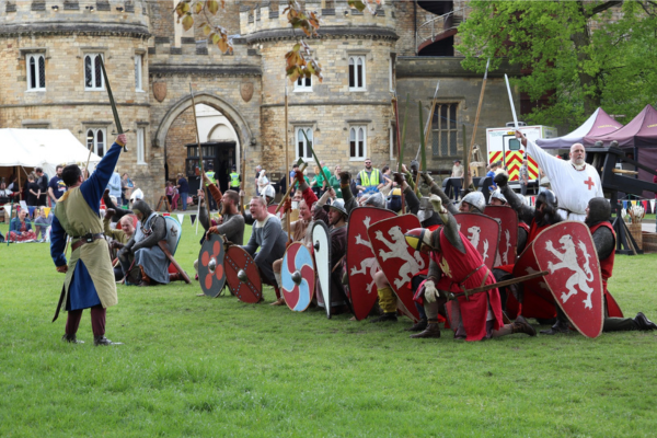 Photo shows medieval reenactors on the battlefield