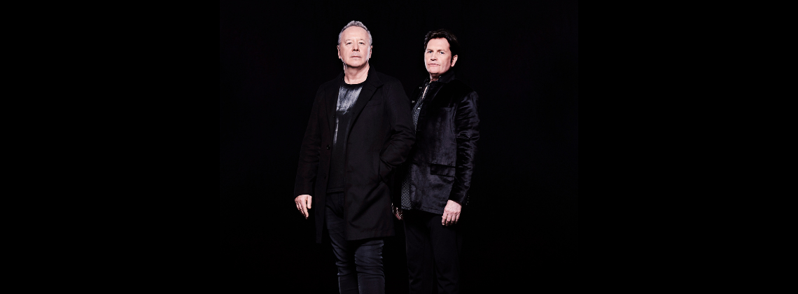 Two band members of Simple Minds