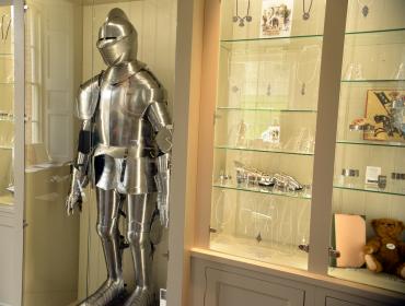 Suit of armor in a glass cabinet